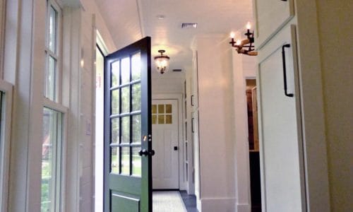 mudroom with green door